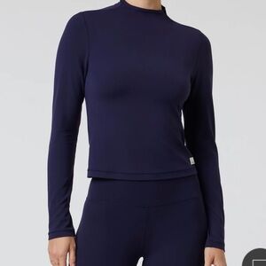 Vuori “all the feels” mock neck top